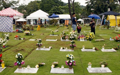 Remembering departed loved ones during typhoon, pandemic