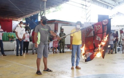 <p><strong>FARMERS CONDEMN CPP-NPA</strong>. Leaders of the farmers associations in Barangay Pilar, Hinigaran, Negros Occidental burned the flag with symbols of the Communist Party of the Philippines-New People’s Army (CPP-NPA) in rites held at the village gymnasium on Friday (Sept. 18, 2020). The farmers also declared the CPP-NPA persona non grata and condemned their atrocities. <em>(Photo courtesy of 303rd Infantry Brigade, Philippine Army)</em></p>
<p> </p>