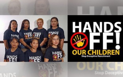 <p><strong>STOP DECEPTIVE RECRUITMENT.</strong> Mothers, whose children were recruited by groups allied with communist terrorists, wear shirts that say "Hands Off Our Children". Armed Forces chief, Lt. Gen. Gilbert Gapay, on Thursday (Sept. 24, 2020) expressed regret over Facebook's decision to take down the page with the same name, whose advocacy is to prevent minors from being recruited into organizations espousing violent extremism.<em> (Photo from Hands Off Our Children FB page)</em></p>