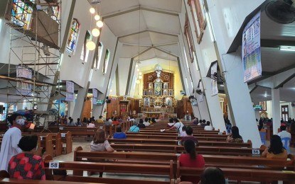 <p><strong>DISTANCING.</strong> Attendees of a novena mass at the Our Lady of Holy Rosary Cathedral in Naval town, Biliran observe physical distancing. The local government on Friday (Sept. 25) said new travel restrictions to avoid mass gatherings will be imposed from Oct. 1 to 3, as the town celebrates its town fiesta. <em>(Photo courtesy of Naval Cathedral)</em></p>