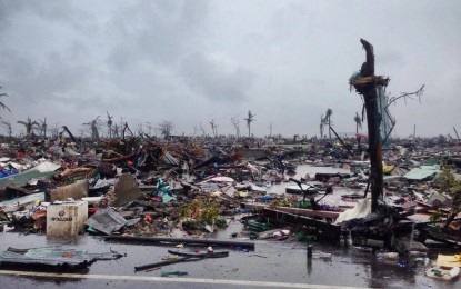 <p><strong>YOLANDA'S WRATH.</strong> A major road in Tacloban City a few days after Super Typhoon Yolanda struck the central Philippines on Nov. 8, 2013. The regional office of the National Economic and Development Authority (NEDA) is optimistic that President Rodrigo Duterte’s directive to extend the term of the body tasked to oversee recovery efforts for “Yolanda”-affected areas would ensure the completion of housing projects. <em>(Contributed photo)</em></p>