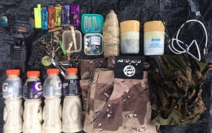 <p><strong>SEIZED. </strong> The terror items recovered by Army troopers from a hideout of the Islamic State-inspired Bangsamoro Islamic Freedom Fighters (BIFF) in Ampatuan, Maguindanao on Friday (Oct. 2, 2020). The BIFF items included three homemade bombs aimed at killing and slowing down pursuing military troopers against them in the interiors of the province. (<em>Photo courtesy of 2MIB</em>) </p>