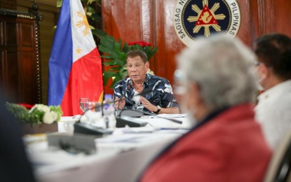 <p><strong>DISCREET PROBE</strong>. President Rodrigo R. Duterte talks to the people after holding a meeting with the Inter-Agency Task Force on Emerging Infectious Diseases core members at the Malago Clubhouse in Malacañang on Monday (Oct. 5, 2020). Duterte said he ordered a discreet probe into extrajudicial killings being blamed on his administration. <em>(Presidential photo by Simeon Celi)</em></p>