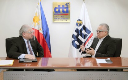 <p><strong>COVID VACCINE TALKS. </strong>Russian Ambassador to the Philippines Igor Khovaev (left), meets Trade Secretary Ramon Lopez (right) for his farewell courtesy call on Tuesday (Oct. 6, 2020). Khovaev and Lopez agree to include discussions on possible manufacturing of the Russian coronavirus vaccine in the Philippines-Russia Joint Economic Commission meeting next month. (<em>Photo courtesy of DTI</em>) </p>