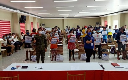<p><strong>LIVELIHOOD KITS.</strong> Some recipients of livelihood kits during the turnover at the San Isidro, Leyte town hall on Oct. 7, 2020. At least 45 former members of the New People’s Army (NPA) in Leyte province have been identified as beneficiaries of livelihood assistance by the Department of Trade Industry. <em>(Photo courtesy of Philippine Army)</em></p>
