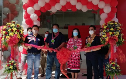 <p><strong>BUSINESS AS USUAL.</strong> Mayor Maria Isabelle Climaco-Salazar (2nd from right) and Vice Mayor Rommel Agan (2nd from left) lead the ribbon-cutting ceremony Saturday (Oct. 10, 2020) that signals the entry of the MG Motors Philippines in Zamboanga City. The MG Motors-Zamboanga is the company's third branch in Mindanao. <em>(PNA photo by Teofilo P. Garcia Jr.)</em></p>