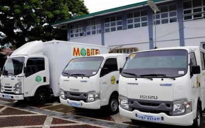 <p><strong>ENHANCING SERVICES TO THE PEOPLE</strong>. The mobile clinic and two multi-purpose vehicles that were procured by the municipal government of Baler, Aurora to boost the delivery of services to the residents. The vehicles were blessed on Monday (Oct. 12, 2020) in a ceremony led by Mayor Rhett Ronan Angara.<em> (Photo by Jason de Asis)</em></p>
