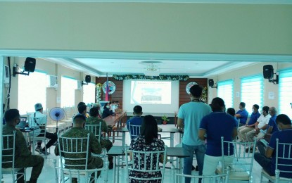 <p><strong>STOPPING EXTORTION</strong>. Officials of the Philippine Army's 91st Infantry Battalion and the local government unit (LGU) of Dingalan, Aurora meet with project engineers of various construction firms on Monday (Oct. 12, 2020) to discuss measures in stopping the extortion activities of the New People's Army. Lt. Col. Reandrew P. Rubio, commanding officer of the 91IB, said the concerted effort of various sectors, particularly the LGUs, is the key to stopping the extortion scheme of the NPA. <em>(Photo courtesy of the Army's 91st IB)</em></p>