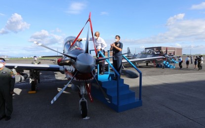 <p><strong>'SUPER TUCANO' ATTACK PLANES.</strong> Defense Secretary Delfin Lorenzana and Philippine Air Force (PAF) commander Lt. Gen. Allen Paredes lead the blessing and turnover ceremony for the A-29B Super Tucano close air support aircraft from Brazil in Clark Air Base, Angeles City Pampanga on Tuesday (Oct. 13, 2020). The Super Tucano aircraft, which will be part of the PAF's 15th Strike Wing, will beef up the remaining SF-260 and OV-10 attack aircraft used by the Air Force in strike missions. <em>(Photo courtesy of PAF)</em></p>