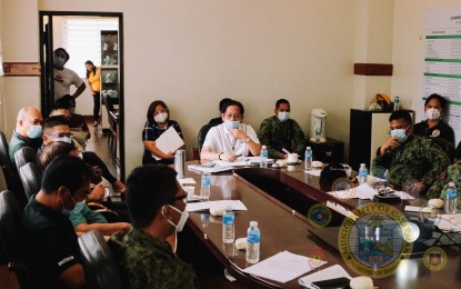 <p><strong>COVID-19 RESPONSE.</strong> Members of the local task force in Catarman, Northern Samar discuss updates on their coronavirus response on Oct. 13, 2020 photo. The 23 villages within the town center of Catarman, the capital town of Northern Samar province have been placed under enhanced community quarantine (ECQ) starting Thursday (Oct. 15, 2020) due to rising cases of coronavirus disease 2019. <em>(Photo courtesy of Catarman local government)</em></p>