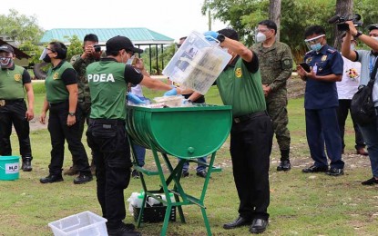 <p><strong>DESTROYED. </strong> Over one kilogram of shabu worth PHP7.1 million and at least 89 grams of marijuana worth PHP10,000 are destroyed in a ceremony led by the Philippine Drug Enforcement Agency in Caraga on Thursday (Oct. 15, 2020) in Butuan City. Officials called on Caraga residents to help the government in its fight against illegal drugs, even amid the coronavirus disease pandemic. <em>(Photo courtesy of PDEA-13 Information Office)</em></p>