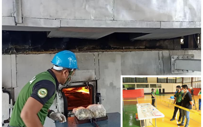 <p><strong>BURNED.</strong> A member of the Philippine Drug Enforcement Agency-Bangsamoro Autonomous Region in Muslim Mindanao looks on as shabu are fed into the incinerator facility of a private plant in Sultan Kudarat, Maguindanao. PDEA-BARMM director Juvenal Azurin (inset, left) said more shabu drugs will be burned in the next few days. <em>(Photo courtesy of PDEA-BARMM)</em></p>