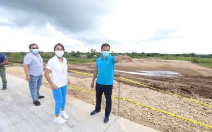 <p><strong>SITE VISIT</strong>. Cebu Governor Gwen Garcia (second from right) led the inspection on Saturday (Oct. 17, 2020) at the ongoing construction of the Bantayan Island Airport’s 1.2-kilometer runway extension project. With her is Mactan-Cebu International Airport Authority general manager Steve Dicdican (rightmost). <em>(Photo courtesy of Cebu Provincial Capitol PIO)</em></p>
<p> </p>