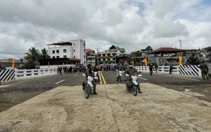 <p><strong>BRIDGE</strong>. Government officials pass through the newly-repaired Bayabao Bridge, also known as Banggolo Bridge. The bridge was inaugurated and opened during the third liberation anniversary in Marawi City on Saturday (Oct. 17, 2020). <em>(PNA photo by Divina M. Suson)</em></p>
<p> </p>