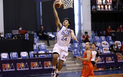 <p><strong>PBA BUBBLE</strong>. NLEX's Kiefer Ravena breezes past NorthPort's LA Revilla to score in their Philippine Basketball Association game at the Angeles University Foundation Sports and Cultural Center on Wednesday (Oct. 21, 2020). Ravena finished with 25 points on 7-of-10 field goals and 10-of-10 free throws.<em> (Photo courtesy of PBA Images)</em></p>