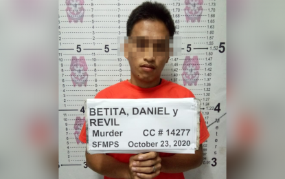 <p><strong>MURDER SUSPECT.</strong> Alleged New People’s Army rebel Daniel Revil Betita, 26, is arrested by police and military operatives in a law enforcement operation on Friday (Oct. 23, 2020) in San Francisco town, Surigao del Norte. Betita is a suspect in the killing of a barangay councilor in 2018.<em> (Photo courtesy of PRO-13 Information Office)</em></p>