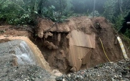 <p><strong>LANDSLIDE</strong>. A road in Sta. Praxedes, Cagayan damaged by landslide as a result of continuous monsoon rains in Northern Luzon. The provincial agriculture office said on Monday (Oct. 26, 2020) that the rains have damaged PHP59.59 million worth of agricultural crops and fisheries. <em>(Photo courtesy of Cagayan Provincial Information Office)</em></p>