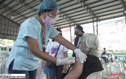 <p><strong>FLU VACCINE</strong>. A total of 1,551 senior citizens from the 25 villages of Tarlac City receive free flu vaccine shots on Tuesday (Oct. 27, 2020). This is in line with the city government's efforts to fight Covid-19<em>. (Photo by the Tarlac City Information Office)</em></p>