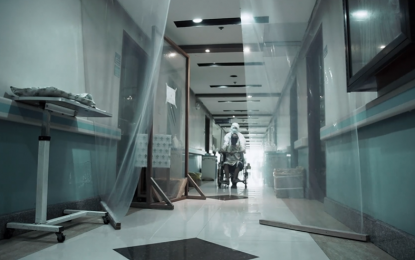 <p><strong>MORE PATIENTS.</strong> A hospital hallway leading to rooms of Covid-19 patients. In the past weeks, more beds are occupied by patients infected with the disease in some cities in Metro Manila.<em> (Screengrab)</em></p>