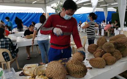 <p><strong>EAT ALL YOU CAN.</strong> The durian fruit is one of the highlights of the three-day “MinDA Tienda sa Manila” that ended on Oct. 25, 2020. The store caravan, which features products from Mindanao, is set to be replicated in Baguio City on November 14-15. <em>(Photo courtesy of MinDA)</em></p>