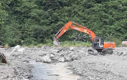 <p><strong>DESILTING.</strong> The municipal government of Gabaldon conducts desilting in Dupinga River in Nueva Ecija on Saturday (Oct. 31, 2020). The Dumagats, who are living at the mountain range along the river, were preemptively evacuated to a higher ground.<em> (Photo by Gabaldon MDRRMO)</em></p>