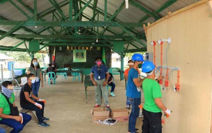 <p><strong>SKILLS WORTH A TREASURE</strong>. A total of 23 former rebels (FRs) who are staying at the halfway house inside the headquarters of the 23rd Infantry Battalion in Buenavista, Agusan del Norte graduated Friday (Oct. 30, 2020) from the 25-day Electrical Installation Maintenance training given by the Technical Education and Skills Development Authority. The FRs said the skills they obtained is worth a treasure as they can use these to rebuild their lives once they go back to their respective families.<em> (Photo courtesy of 23rd IB)</em></p>