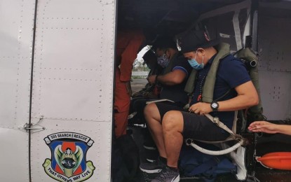 <p><strong>TYPHOON ASSESSMENT</strong>. Personnel of the Regional Disaster Risk Reduction Management Council in Bicol are seen preparing to fly to Catanduanes on Monday morning (Nov. 2, 2020) to check the situation on the ground after the onslaught of Super Typhoon Rolly the previous day. The Office of Civil Defense said initial reports showed 17 people died in the region at the height of the typhoon's fury.<em> (Photo courtesy of Jessar Adornado/OCD Bicol)</em></p>