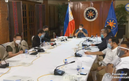 <p><strong>TYPHOON BRIEFING</strong>. President Rodrigo Duterte presides over a Cabinet meeting to tackle the government’s response to Super Typhoon Rolly on Monday (Nov. 2, 2020). Before the meeting, Duterte conducted aerial inspection of the areas heavily affected by the typhoon. <em>(Screenshot)</em></p>