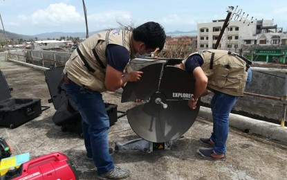 <p><strong>ALTERNATIVE COMMUNICATIONS SYSTEM.</strong> Personnel from the Office of Civil Defense install an emergency communications system in Catanduanes in the aftermath of Super Typhoon Rolly on Monday (Nov. 2, 2020). DILG Secretary Eduardo Año said local government units can acquire backup communications systems through calamity funds of the National Disaster Risk Reduction and Management Council and the Office of Civil Defense or even from their own funds. <em>(Photo courtesy of OCD)</em></p>