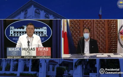 <p><strong>WELL-DESERVED</strong>. Presidential Spokesperson Harry Roque (left) defends the appointment of Secretary Carlito Galvez Jr. (right) as vaccine czar during the virtual Palace briefing on Tuesday (Nov. 3, 2020). Roque said it’s a “very well-deserved” appointment. <em>(Screenshot)</em></p>