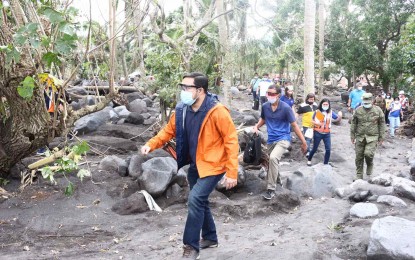 <p><strong>INSPECTION.</strong> DPWH Secretary Mark Villar checks the situation in Barangay San Francisco, Guinobatan, Albay, one of the hard-hit areas by Super Typhoon Rolly on Wednesday (Nov. 4, 2020). Villar said all national roads in the province have already been cleared. <em>(Photo courtesy of Mark Villar Facebook page)</em></p>