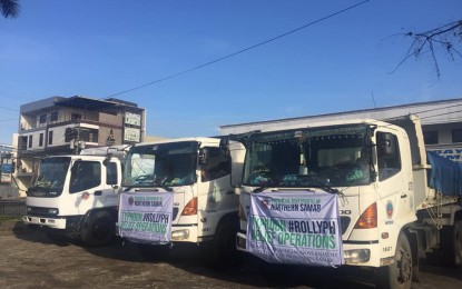 <p><strong>AID FOR TYPHOON VICTIMS.</strong> The trucks used in transporting the first batch of relief augmentation from the province of Northern Samar to areas hit by Super Typhoon Rolly (international name Goni) in the Bicol Region. The provincial social welfare and development office (PSWDO) on Saturday (Nov. 7, 2020) said the provinces of Albay and Catanduanes each received 500 sacks of rice, 200 boxes of assorted canned goods, 200 boxes of bottled water, and 100 boxes each of cereal drink and powdered milk. (<em>Photo courtesy of Northern Samar PSWDO</em>) </p>