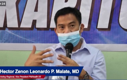 <p>Dr. Hector Zenon Leonardo Malate, acting regional vice president of Philippine Health Insurance Corporation-Region 12. <em>(File screengrab of live-streamed press briefing)</em></p>
