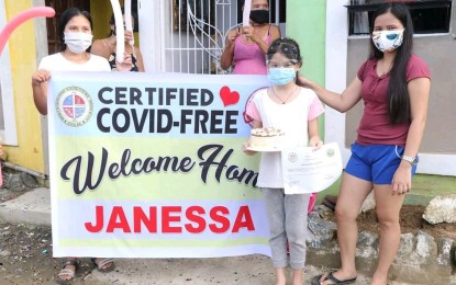 <p><strong>YOUNG SURVIVOR</strong>. A young Covid-19 survivor in Palo, Leyte receives a welcome home cake from the local government in this undated photo. The Department of Health on Thursday (Nov. 12, 2020) reported that a total of 6,879 coronavirus patients in Eastern Visayas have recovered. <em>(Photo courtesy of Palo local government)</em></p>