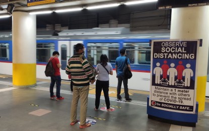 <p><strong>MORE PASSENGERS</strong>. Passengers observe physical distancing as they wait for the next train of the Metro Rail Transit Line 3 (MRT-3) in this undated photo. The MRT-3 said it served a total of 157,855 passengers on Monday (Jan. 18, 2021), the highest number recorded in a single day since June 1, 2020 when it resumed operation after over two months of closure due to the Covid-19 pandemic. <em>(Photo courtesy of MRT-3)</em></p>