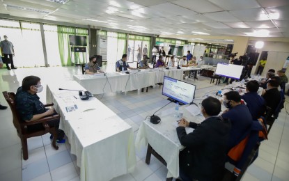 <p><strong>SITUATION BRIEFING.</strong> President Rodrigo Duterte presides over a situation briefing with the members of his Cabinet and local government officials at the Tuguegarao Airport in Tuguegarao City, Cagayan on Nov. 15, 2020. Duterte discussed with national and local officials the disaster response measures and relief efforts on the aftermath of Typhoon Ulysses. <em>(Presidential photo by Arcel Valderrama)</em></p>