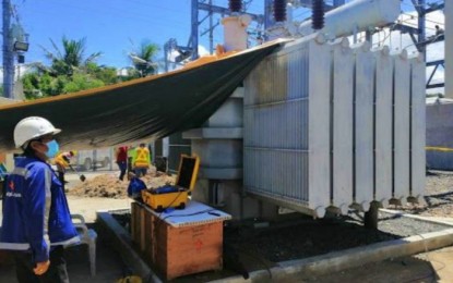 <p><strong>KEEPING UP WITH POWER DEMAND.</strong> Personnel of AboitizPower distribution utility, Cotabato Light and Power Company, test its new power transformer in Malagapas District in Cotabato City on Wednesday (Nov. 18, 2020). The project aims to respond to the rising energy demand to the city's growing economy, even amid the pandemic. <em>(Photo courtesy of Cotabato Light)</em></p>