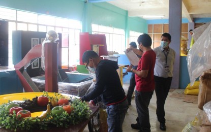 <p><strong>PREPARING FOR EXHIBIT.</strong> Officials of the Department of Science and Technology (DOST) inspect on Wednesday (Nov. 18, 2020) the newly acquired technologies that will be used in a soon-to-open exhibit. Eastern Visayas is setting up its first Science Centrum Interactive Exhibit in a bid to promote public awareness and appreciation of science, technology, and innovation<em>. (Photo courtesy of John Glenn Ocaña)</em></p>