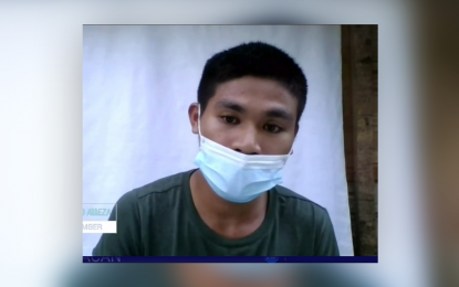 <p><strong>NEW LIFE.</strong> Former New People's Army combatant Christian Montenegro Arreza, 20, recounts his ordeal while with the communist rebels during a virtual presser hosted by the National Task Force to End Local Communist Armed Conflict on Thursday afternoon (Nov. 19, 2020). Arreza, a Surigao del Sur resident, says he wants to become a police officer someday. <em>(Screenshot from NTF-ELCAC virtual presser)</em></p>