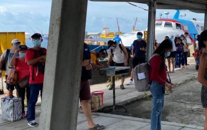 <p><strong>PASSENGER TRAFFIC.</strong>  Fastcraft passengers from Iloilo City arrive at the Bredco port in Bacolod City in one of the recent trips after travel between the two cities resumed on Oct. 31, 2020.  According to the Metro Bacolod Chamber of Commerce and Industry, the volume of passengers and cargoes moving in and out of Panay and Negros Islands has been steadily increasing with further ease of Covid-19 quarantine restrictions.<em> (File photo courtesy of Philippine Coast Guard-Negros Occidental)</em></p>