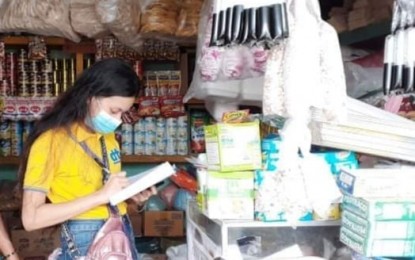 <p><strong>AVOID LAST MINUTE</strong>. A Department of Trade and Industry (DTI) personnel monitors prices of Noche Buena products in a retail store in Sibalom town, Antique on November 17, 2020. The DTI advised consumers to do early shopping to avoid crowding in shopping malls and grocery stores. <em>(PNA photo by Annabel Consuelo J. Petinglay)</em></p>