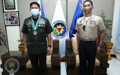 <p><strong>AFPLDC ANNIVERSARY.</strong> AFP chief of staff, Gen. Gilbert Gapay (left) and AFP spokesperson, Marine Maj. Gen. Edgard Arevalo grace the second anniversary of the AFP Leadership Development Center (AFPLDC) in Camp Aguinaldo, Quezon City on Thursday (Nov. 26, 2020). Gapay lauded the personnel of the AFPLDC for being able to quickly adapt to changes and crises. <em>(Photo courtesy of AFP Public Affairs Office)</em></p>