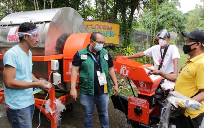 <p><strong>COMPOSTING MACHINERY.</strong> Department of Agriculture Region 9 executive director Rad Donn Cedeno (2nd from left) inspects on Friday (Nov. 27, 2020) the composting facilities distributed to 11 towns in the region by the Bureau of Soils and Water Management. The distribution is in line with the bureau's mandate to ensure the safety and effective use of soil and water resources.<em> (Photo courtesy of Department of Agriculture-9)</em></p>