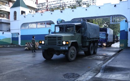 <p><strong>AID ON THE WAY.</strong> Trucks carrying relief packs for flood victims in Cagayan province leave Camp Aguinaldo in Quezon City on Monday (Nov. 30, 2020). Since the start of its relief operations for victims of Typhoon Ulysses, the AFP has distributed a total of 55, 250 food packs in Northern Luzon, Southern Luzon, and the National Capital Region as of November 28. <em>(Photo courtesy of AFP Public Affairs Office)</em></p>
