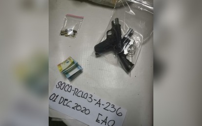 <p><strong>EVIDENCE</strong>. The confiscated pieces of evidence from an alleged leader of a gun-for-hire group neutralized in City of San Jose Del Monte, Bulacan on Tuesday (Dec. 1, 2020). Col. Lawrence Cajipe, provincial director of the Bulacan PNP, identified the suspect as Rizaldy Gutierrez of Concordia Subdivision, Barangay Dulong Bayan, City of San Jose Del Monte, Bulacan. <em>(Photo by Bulacan PPO)</em></p>