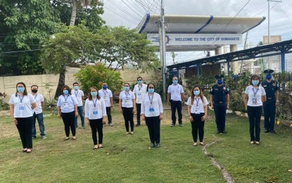 <p><strong>TARGET COLLECTION EXCEEDED</strong>. The officials and employees of the Bureau of Customs Sub-port in Dumaguete City, which has exceeded its target revenue collection this year by more than 10 percent. As of Nov. 20, 2020, the sub-port reported earning some PHP4.8 billion above its target of PHP4.3 billion.<em> (Photo courtesy of BOC Dumaguete Sub-port Office)</em></p>