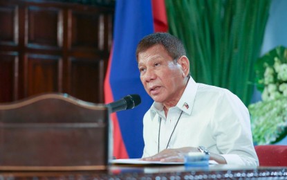 <p><strong>GCQ</strong>. President Rodrigo Roa Duterte talks to the people after holding a meeting with the Inter-Agency Task Force for the Management of Emerging Infectious Diseases (IATF-EID) core members at the Malago Clubhouse in Malacañang Park, Manila on Nov. 30, 2020. Duterte said Metro Manila, the provinces of Batangas and Lanao del Sur, and the cities of Iloilo, Tacloban, Iligan, and Davao will remain under general community quarantine (GCQ) until Dec. 31. <em>(Presidential photo by Karl Norman Alonzo)</em></p>