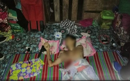 <p><strong>KILLED IN SHOOTOUT.</strong> Suspected bomber Abraham Abad Abdulrahman lays dead inside his hideout following a predawn shootout with authorities in Barangay Bagua 2, Cotabato City on Tuesday (Dec. 1, 2020). A report from the Criminal Investigation and Detection Group says the suspect was one of those who planned and carried out the Dec. 31, 2018 bombing at the entrance of South Seas Mall in Cotabato City that killed two and injured 34 other shoppers. <em>(Photo courtesy of Brigada News FM Cotabato)</em></p>