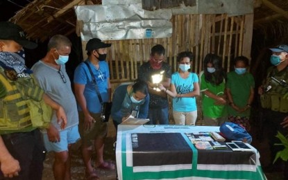 <p><strong>DISMANTLED.</strong> Anti-narcotics agents account for PHP120,000 worth of shabu and other drug paraphernalia seized on Wednesday night (Dec. 2, 2020) from a group operating a drug den in Datu Odin Sinsuat, Maguindanao. Four suspects, including three females, were arrested during the operation conducted at around 9 p.m. <em>(Photo courtesy of Rocky Lauban - Brigada News FM Cotabato)</em></p>