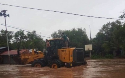 <p><strong>CEBU FLOODS.</strong> Heavy equipment is submerged in floodwaters in Barangay Poblacion, Tuburan, a north-western town of Cebu province. The Provincial Disaster Risk Reduction and Management Office monitored flooding in at least 30 villages in six local government units in Cebu province on Wednesday (Dec. 2, 2020) due to rainfalls caused by thunderstorms. <em>(Photo courtesy of Johnley Bayking)</em></p>